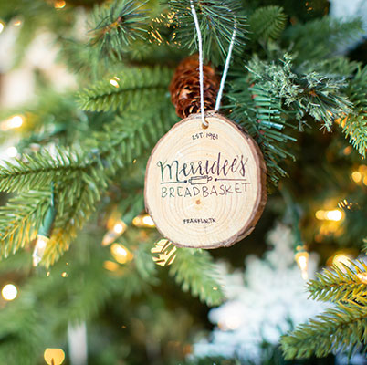 Christmas ornament on decorated tree